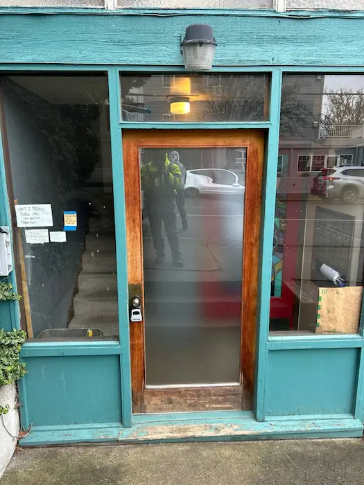 Storefront entry with large commercial glass panels